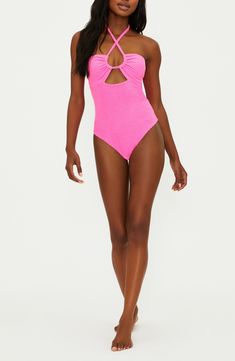 Feel your best on land and at sea in this textured one-piece fashioned with sunny cutouts and a halter neck. Ties at neck Halter neck Moderate back coverage 96% polyester, 4% spandex Machine wash, tumble dry Imported Summer Poolside One-piece Halter Top, Stretch One-piece Halter Top For Pool, Pink Printed One-piece Swimwear, Multicolor One-piece Swimwear With Lined Body For Poolside, Playful Pink One-piece Swimwear, Strawberry Moon, Beach Riot, Solid And Striped, Halter One Piece Swimsuit