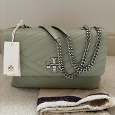 New Mint Green Tory Burch Bag, Unused, Never Worn. Brand New With Tags, Dust Bag Included. Can Be Worn As A Crossbody Or Shoulder Bag. Leather Exterior With Fabric Interior. Tory Burch Miller Handbag, Tory Burch Green Bucket Bag, Tory Burch Crossbody Handbags, Leather Crossbody Bag Tory Burch, Ar Accessories, Tory Burch Bags, Tory Burch Bag, Walker Boots, Fit N Flare Dress