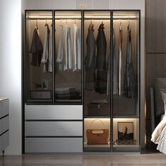 an image of a bedroom setting with closets and clothes on the shelves in it