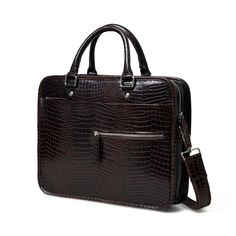 Indulge in trend with our Croco Leather Computer Bag. Made of premium full grain buffalo leather, this dark brown laptop bag features an elegant croco pattern that is perfect for your everyday work and wear. Keep your computer protected in style, and make a statement with this exclusive piece. Salient features: Handcrafted with full grain buffalo leather Color dark brown on textured leather Sleek and minimalistic look One main compartment to carry all your essentials Small zippered pocket in fro Business Brown Crocodile Pattern Bag, Leather Shoulder Bag With Crocodile Pattern For Business, Business Leather Shoulder Bag With Crocodile Pattern, Brown Crocodile Pattern Satchel For Business, Brown Crocodile Pattern Shoulder Bag For Business, Leather Satchel With Crocodile Pattern For Business, Business Leather Bags With Crocodile Pattern, Leather Bags With Crocodile Pattern For Business, Formal Leather Satchel With Crocodile Pattern