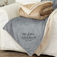 a personalized throw blanket on a couch