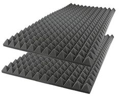 two black acoustic foams are stacked on top of each other, with pyramid shapes in the middle