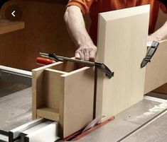 a man is working with woodworking tools