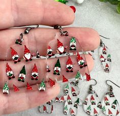 Cute Gnome Christmas Dangle Earrings These are the cutest to add to your Christmas jewelry collection! These dangle earrings are made from 1/8 inch printed clear acrylic. The acrylic features a scattered design of Christmas gnomes. Available in various shapes and dimensions, as shown in photos. Earrings include hypoallergenic stainless-steel (nickel free) hardware included. Gnome Earrings For Christmas, Gnome Christmas, Christmas Gnomes, Shrink Plastic, Earrings Cute, Christmas Earrings, Christmas Jewelry, Christmas Gnome, Wonderful Time