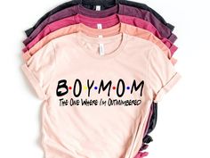 Smart Buys! Mom of boys outnumbered shirt, Boy Mom Shirt, Mothers Day Gift, Custom Mom Of Boys Shirt, Mom Graphic Tshirt, Personalized Shirt For Mom starting from €33.91 See more. 🤓 #PersonalizedShirt #BoyMomTshirt #MomGraphicTshirt #MomLife #MamaTee #BoyMomShirt #ShirtForBoyMom #CustomMomShirt #MothersDayGift #MomOfBoysShirt Boy Mama Shirt, Twin Mom Shirt Ideas, Boy Mom Shirt Ideas, Mom Of Both Shirt Ideas, Mothers Day Shirt Ideas Mom, Boy Mom Outfits, Boy Mama Shirts, Boy Mom Shirts, Boy Mom Tshirt