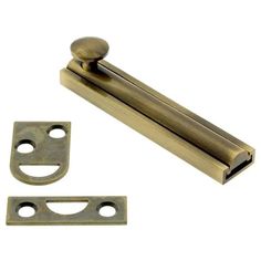 an antique brass door handle and latch with two pieces of metal on the bottom side