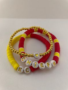 Kansas City Chiefs bracelet stack | KC Chiefs bracelets | stretchable bracelets Kansas City Chiefs Friendship Bracelet, Kansas City Chiefs Clay Bead Bracelet, Adjustable Red Friendship Bracelets With Letter Beads, Red Stacked Beaded Bracelets For Gifts, Red Stacked Beaded Bracelets As Gift, Stackable Bangle Bracelet For Friendship, Stackable Stretch Bracelet For Friendship, Adjustable Personalized Red Stretch Bracelet, Red Adjustable Personalized Stretch Bracelet