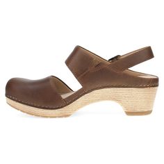 Lucia is the heeled, closed-toe clog that makes the transition into fall adjustable and adorable. Brown Mules With Low Wooden Heel, Brown Low Heel Mules With Heel Strap, Brown Mules With Heel Strap And Low Heel, Brown Closed Toe Clogs With Deep Heel Cup, Brown Clogs With Wooden Low Heel, Closed Toe Clogs With Stacked Heel, Brown Low Heel Clogs With Heel Strap, Brown Low Heel Mules With Stacked Heel, Brown Mules With Stacked Low Heel