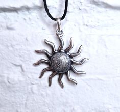 Symbol of the Sun in the Latvian folklore is widely used. Meaning of the Sun varies from representation of the human life's two cycles, till unity, entirety, endless movement and protection. The Sun for Latvians is a symbol of highest ethical standards, the same as white color. ---------------------------------------------------------------------------------------------------------------------- All our jewelry is handmade in our small family owned silversmith workshop.   Dimensions: Height: 30 m Latvian Folklore, Silversmith Workshop, Boho Style Necklaces, Norse Jewelry, Sun Necklace, Unisex Necklace, Gift For Woman, Necklace Boho, Small Family