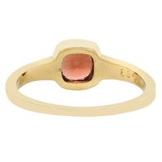 Add some color and deco style to your everyday look with this vibrant garnet wrapped in a 14k yellow gold bezel. This solitaire ring has a clean, minimal look on the finger with its square-shaped silhouette. An everyday classic. Stones: Approx 1.0ct Red Cushion Cut GarnetMetal: 14k Yellow GoldMeasurements: Setting length: 13.5mm, Stone length: 5mm, Setting width: 6.9mm, Setting height: 4.5mm, Band width: 2-1.4mm Size 6 in stock Shipping and Delivery: IN STOCK items will ship within 2 business da Red Cushion, Notes Gift, Ring Bezel, Minimal Look, Red Cushions, Cushion Ring, Garnet Ring, Garnet Rings, Cushion Cut