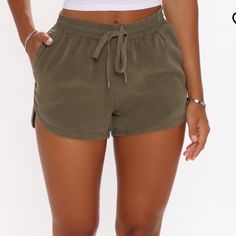 Olive Green Shorts, Elastic Waist, Drawstrings, Pockets, Brand New, Never Worn Summer Stretch Shorts With Drawstring, Stretch Drawstring Summer Shorts, Khaki Bottoms For Summer Leisure, Khaki Bottoms For Leisure In Summer, Trendy Leisure Shorts With Drawstring, Trendy Drawstring Leisure Shorts, Casual Tie-side Bottoms With Tie Waist, Khaki Drawstring Bottoms Short Length, Khaki Drawstring Bottoms Of Short Length