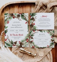 the wedding stationery is decorated with holly and pine cones, red berries, and greenery