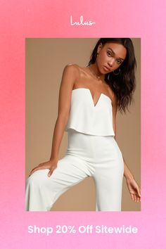 You'll be absolutely irresistible when you're wearing the Lulus Power of Love White Strapless Jumpsuit! Stretch crepe knit shapes a strapless bodice with a fluttering tier, hidden V-bar, and no-slip strips. A high, fitted waist tops relaxed wide leg pants. Hidden back zipper. Fit: This garment fits true to size. Length: Floor length. Size medium measures 56.25" from top to bottom. Inseam: 32.75 Front Rise: 14.25 Bust: Works best for A to C cup sizes - consider sizing up for fuller bust. Waist: Fitted - very fitted at natural waist. Hip: Fitted - stretchy fabric allows room for hips. Undergarments: May be worn with petals, or no bra. Fabric: Fabric is very stretchy. Fully lined. Shell: 96% Polyester, 4% Spandex. Lining: 100% Polyester. Hand Wash Cold. Do Not Bleach. Line Dry. Iron Low Heat. Flirty Strapless Jumpsuits And Rompers For Date Night, Flirty Strapless Jumpsuits For Date Night, Fitted Strapless Flirty Jumpsuits And Rompers, Flirty Strapless Fitted Jumpsuits And Rompers, Elegant Strapless Sleeveless Jumpsuit With Ruffles, Elegant Strapless Jumpsuits And Rompers For Spring, Elegant Bandeau Strapless Jumpsuit, Chic White Bandeau Jumpsuits And Rompers, White Strapless Jumpsuits And Rompers For Date Night