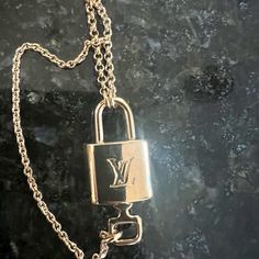 Authentic!! This Beautiful Necklace Was A Gift And I Have Worn It Two Times. There Is No Visible Scratches On The Lock. The Chain Is 12 Inches Long. Comes With Original Box And Jewelry Bag Louis Vuitton Jewelry, Lock And Key, Key Necklace, Jewelry Bags, Original Box, Womens Jewelry Necklace, Beautiful Necklaces, Louis Vuitton, Jewelry Necklaces