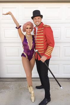 a man and woman dressed up in costumes