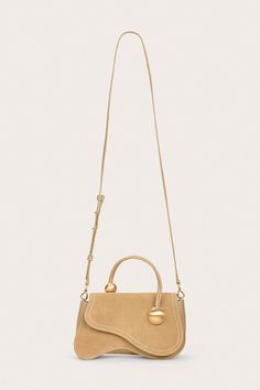 KAZIA CROSSBODY BAG - SAND DOLLAR – CULT GAIA January 2nd, Miami Design, Cult Gaia, Sand Dollar, Snap Back, Snap Backs, Crossbody Strap, Cow Leather, Suede Leather