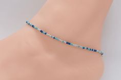 .  Beach Anklet, Beaded Anklet, Anklet Jewelry, Ankle Bracelet, Boho Anklet, Hippie Anklet, Gift For Her, Women's, Blue Anklet, Hippie Anklet, Turquoise Anklet, Silver Anklet Dainty anklet is made with 11/0 Czech seed beads in blue, silver, and turquoise, with 2mm silver filled beads with a lobster clasp.  All items in my store are made buy me. Please send me a message if you want a custom order or need a size that is not listed in the drop down menu.  Size: Measure your anklet above the anklet Blue Tiny Beads Anklet For Gift, Blue Anklet With Tiny Beads For Gift, Blue Round Beads Anklets For Gifts, Blue Anklets With Round Beads For Gift, Blue Tiny Beads Anklet For Festival, Adjustable Blue Anklets With Colorful Beads, Blue Round Bead Anklets For Festival, Blue Festival Anklets With Tiny Beads, Blue Anklets With Colorful Beads For Gifts