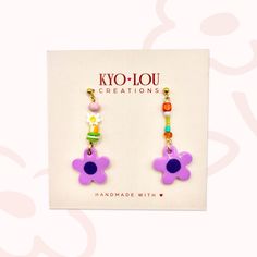 Warm welcome to my shop  Add a pop of colour to your look with these cute, mini handmade daisy dangle earrings! 🌸 Daisy Colour: Violet Blooms 🌸 Materials: Lightweight polymer clay earrings with assorted beads, 316L surgical stainless steel gold studs, front side coated with resin. 🌸 Drop length: 5cm (length vary slightly by a few mm) 🌸 Width: 1cm (at it's widest) 🌸 The beads alongside the daisy will vary slightly in colour and size, making your pair truly unique! 🌸 Each pair comes an organ Birthday Dangle Single Earring, Playful Purple Hypoallergenic Jewelry, Playful Hypoallergenic Purple Jewelry, Trendy Adjustable Earrings For Birthday, Playful Handmade Flower Earrings, Fun Purple Dangle Jewelry, Playful Single Dangle Earring, Playful Purple Dangle Jewelry, Trendy Dangle Flower Earrings As Gift