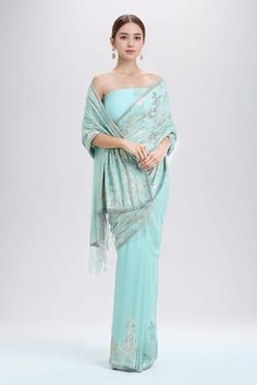 Porcelain blue saree with abstract pattern sequin embellishments. Comes with matching sequin embellished blouse. - Aza Fashions Transitional Blue Georgette Blouse Piece, Blue Fitted Pre-draped Saree For Transitional Season, Embroidered Blue Pre-draped Saree For Transitional Season, Transitional Embroidered Blue Pre-draped Saree, Blue Georgette Pre-draped Saree For Formal Occasions, Sequins Saree, Sequin Saree, Blue Saree, Embellished Blouse