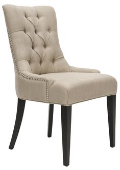 a gray chair with studded arms and legs