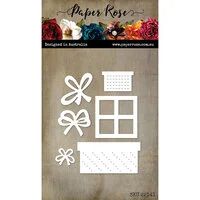 the paper rose die set is shown with flowers and bows on it's side