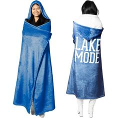 One-Size-Fits-Most 50" x 60" main section. Oversized 11" hooded blanket with 8" square pockets and a 6.5" openingsuper soft royal plush 100% polyester 320 GSM material. All white interior with a blue exterior and large white "Lake Mode" sentiment printed onto the center back of the cloak. The pockets are perfect for putting hands into to wrap up tight with warmth and maybe even hold some small snacks or a phone. The lake is a beautiful getaway to soak up the sun, ride the boat, sit next to the f All White Interior, Blue Exterior, White Lake, Travel Hat, Kid Lifestyle, Small Snacks, Hooded Blanket, White Interior, All White