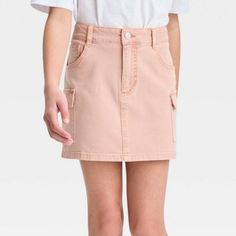 This Above-Knee Canvas Skirt Is Made Of A Lightweight Fabric With Added Spandex That Keeps Them In Breathable Comfort No Matter Where The Day Takes Them. Tailored In A Casual Fit, The Mid-Rise Skirt Features Fly Button And Zipper Button For A Secure Fit, While Cargo And Side Pockets Add Functional Flair To Their Look. Sizes: S (6/7), M (8), L (10/12), Xl (14), Xxl (16/18) Color: Pink Materials: Cotton, Spandex Care: Machine Washable Approx Measurements (Taken While Laying Flat) S (6/7) Waist: 12 Canvas Skirt, Pocket Skirt, Kids Art Class, Cargo Skirt, Cargo Pocket, Casual Fit, Skirts With Pockets, Art Class, Casual Fits