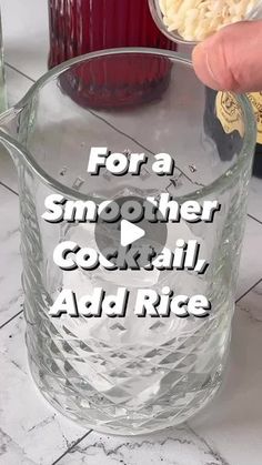 someone is pouring something into a glass with the words for a smoother cocktail, add rice