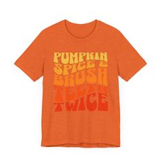 This is a unisex shirt. Please see the provided chart for correct size.  The design on the shirt is intended to have a more monochromatic look and may not stand out on certain T-shirt colors. Please keep this in mind when selecting a color and view the product photo. Celebrate the Fall season with our 'Pumpkin Spice and Brush Teeth Twice' shirt! Perfect for dental professionals who enjoy a touch of autumn flair, this playful design blends the cozy charm of fall with a reminder of essential dental care. Whether you're a dentist, hygienist, or dental assistant, this shirt adds a fun twist to your workday while showcasing your love for both pumpkin spice and perfect oral hygiene. Ideal for wearing at the office, during fall-themed events or as a gift for you favorite hygienist or dental care Dental Receptionist, Dentist Hygienist, Dental Shirts, Brush Teeth, Themed Events, Dental Assistant, Dental Office, Oral Hygiene, Autumn Theme