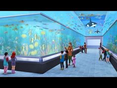 people are looking at an aquarium in a building with many fish on the walls and under water