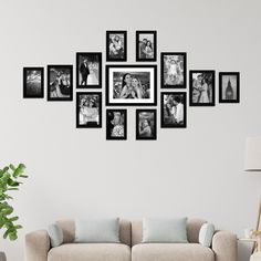 a living room filled with furniture and framed pictures on the wall next to a couch