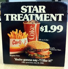 a sign advertising a burger and fries for star treatment $ 19 99 at a fast food restaurant