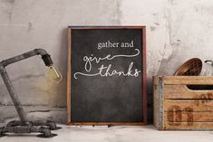 a chalkboard with the words gather and give thanks written on it next to some tools