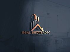 the real estate logo is shown on a dark background with an orange and black color scheme