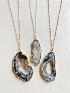 ✧ A one of a kind crystal geode on a 14k gold filled or sterling silver chain, so your jewelry can be cherished for years to come! If you have a preference of stone, please let me know as these stones come with holes in the middle (geode style) or flat slices of stone. If you have a preference you can add it in your purchase notes. ✧ QUARTZ amplifies energies / opens the mind and heart / attracts love / increases prosperity and abundance / enhances energy flow / balances and grounds / cleanses and purifies negative energy / stimulates positive thoughts and feelings / increases awareness / promotes harmony ✧ WHAT IS GOLD FILL CHAIN? Gold fill chain does not change colors or rub off. My chain is filled and bonded to sterling silver, so you can wear it everyday without it fading. Only the bes Natural Stones Mineral Crystal Jewelry Gift, Gold Agate Necklace With Large Stone, Gold Crystal Necklace With Raw Stone For Gifts, Gold Crystal Necklace With Raw Stone As Gift, Spiritual Agate Jewelry For Weddings, Agate Jewelry With Large Stone For Gifts, Gold Crystal Necklaces With Natural Stones As Gift, Gold Round Agate Jewelry, Elegant Raw Stone Jewelry For Gifts