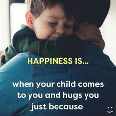 a young boy is hugging his mother's chest and the caption reads, happiness is when your child comes to you and hugs you just because it