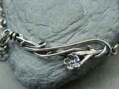 Adjustable Silver Bracelet Nature Inspired Gift for Her - Etsy Hand Wrapped Sterling Silver Bracelet, Silver Wire Wrapped Flower Jewelry, Elegant Hand Forged Sterling Silver Bracelet Gift, Hand Forged Flower Jewelry Gift, Flower Shaped Hand Forged Jewelry Gift, Hand Forged Flower Shaped Jewelry Gift, Hand Forged Sterling Silver Bracelet As Gift, Silver Wire Wrapped Nature-inspired Jewelry, Silver Nature-inspired Wire Wrapped Jewelry