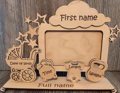 a wooden photo frame with baby's first name