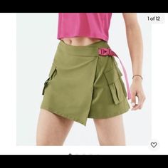 Nwt- $69.95 Fabletics Jillian Wrap Skirt Olive Green/ Pink Trim Size Xl 12/14 51”- From Side To Side Laying Flat- Unwrapped 18”- Across Back Of Waist Laying Flat 16”- Length Down Back Laying Flat 92% Polyester 8% Elastane Olive Green Skirt, Athletic Skirt, Flounce Skirt, Tennis Skort, Golf Skirts, Stretch Skirt, Pink Trim, Gray Skirt, Green Skirt