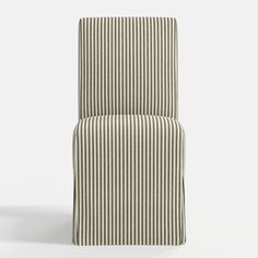 a striped chair sitting on top of a white floor