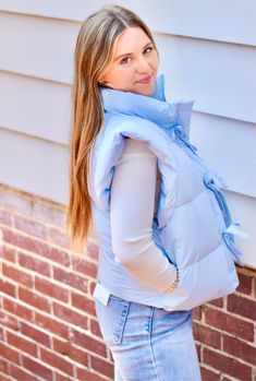 Ruffle Puffer Vest With Bow Tie DetailFleece lined pockets!! 100%POLYESTER Blue Ruffled Outerwear For Spring, Fall Blue Ruffled Outerwear, Fashion Cupcakes, Girls Golf, Swag Bag, Jumpsuits And Romper, Capri Blue, Blue Bow, Golden Girls