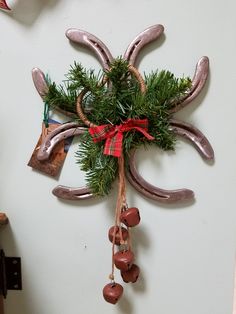 a christmas decoration hanging from the side of a wall