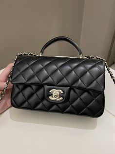 Chanel Quilted Top Handle Mini RectangularBlack Lambskin LGHWSize 20 x 12.5 x 6.5 cmChain drop 53 cmMicro ChipOct 20219.5/10 Excellent (minor underflap imprint, minimal faint sign of use otherwise almost like new)Includes full set box, dust bag and receiptPrice now 6200 sgd 4600 usd CN5781-01 Chanel Top Handle Bag, Lv Montaigne, Designer Bags Louis Vuitton, Chanel Top, Quilted Top, Burberry Sunglasses, Black Baby, Black Backpack, Black Mini