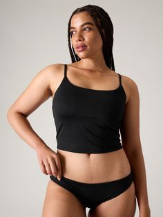 Scoop Crop Tankini A-C | Athleta Sports Black Swimwear With Light Support, Black Seamless Sports Tankini, Black Light Support Swimwear For Sports, Sporty Black Seamless Tankini, Sporty Black Tops For Water Sports, Sporty Fitted Swimwear With Light Support, Fitted Swimwear With Light Support For Sports, Sporty Swimwear With Tank Straps, Light Support Nylon Swimwear