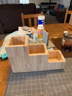 a wooden box sitting on top of a table