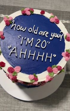 a birthday cake with the words how old are you? i'm 20 ahh