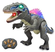 a toy dinosaur with its mouth open and glowing eyes