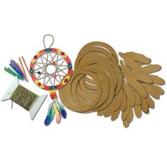 an assortment of crafting supplies including feathers and beads