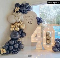 balloons are arranged in the shape of letters and numbers for an anniversary party or celebration