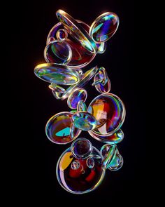 soap bubbles floating in the air on a black background with an image of a teddy bear